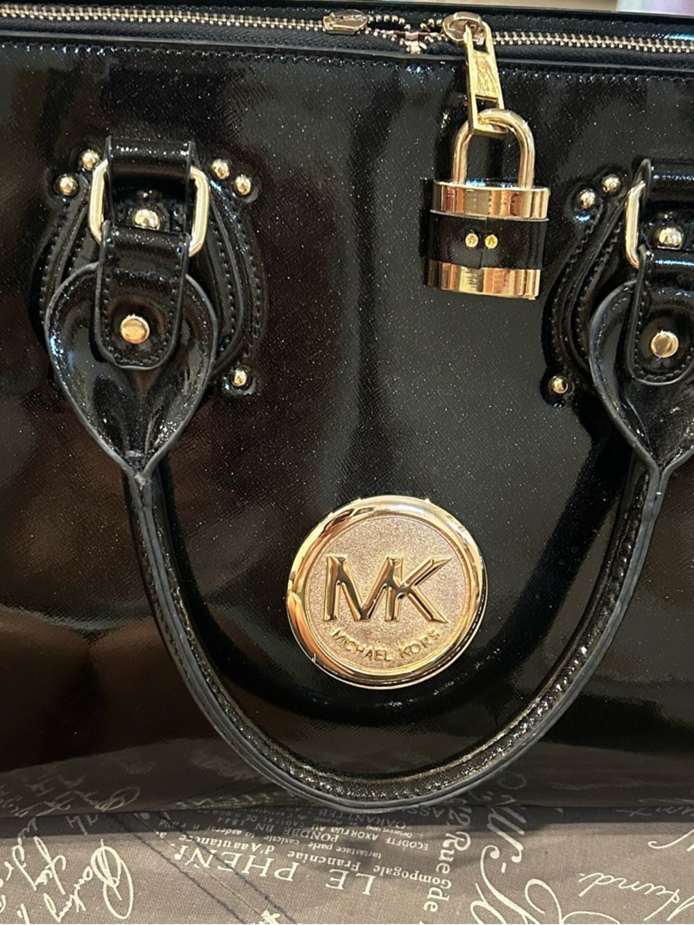 Michael Kors Black Patent Satchel with Gold Lock and Logo Medallion